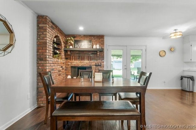 1138 N Gum Ave, Broken Arrow, OK 74012 - dining room with french doors, baseboards, and wood finished floors