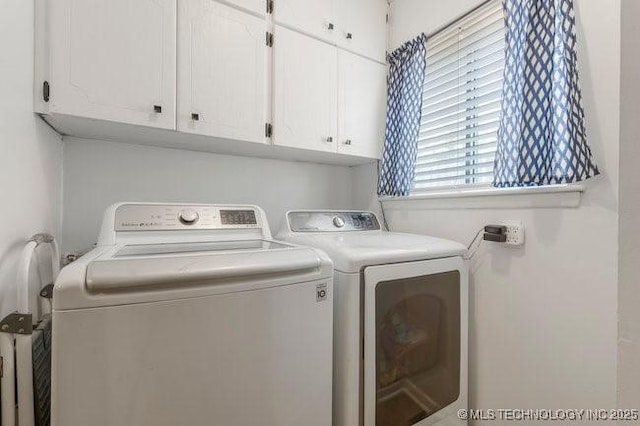 1138 N Gum Ave, Broken Arrow, OK 74012 - laundry room with independent washer and dryer and cabinet space