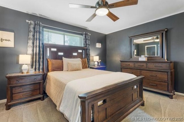 1138 N Gum Ave, Broken Arrow, OK 74012 - bedroom featuring light colored carpet, ceiling fan, and baseboards