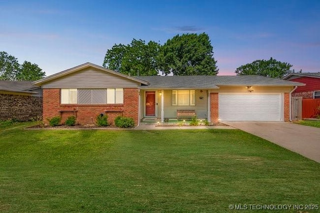 1138 N Gum Ave, Broken Arrow, OK 74012 - ranch-style house featuring a garage, brick siding, concrete driveway, and a front yard