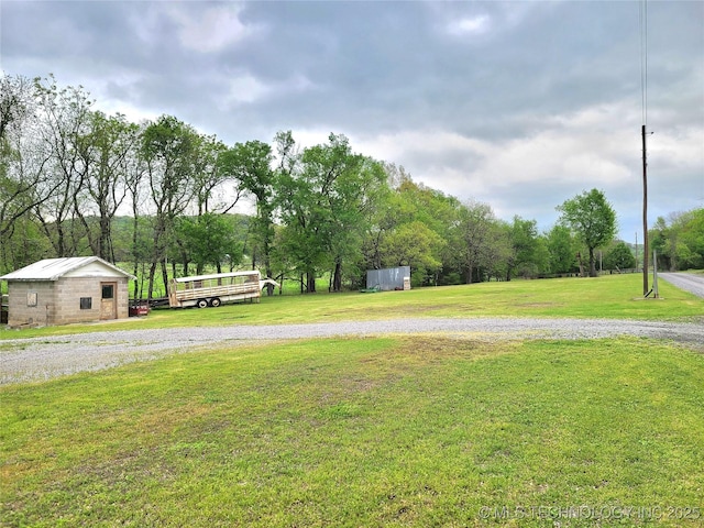 1950 Cedar Bluff Rd, Fort Gibson, OK 74434 - view of green lawn with an outdoor structure