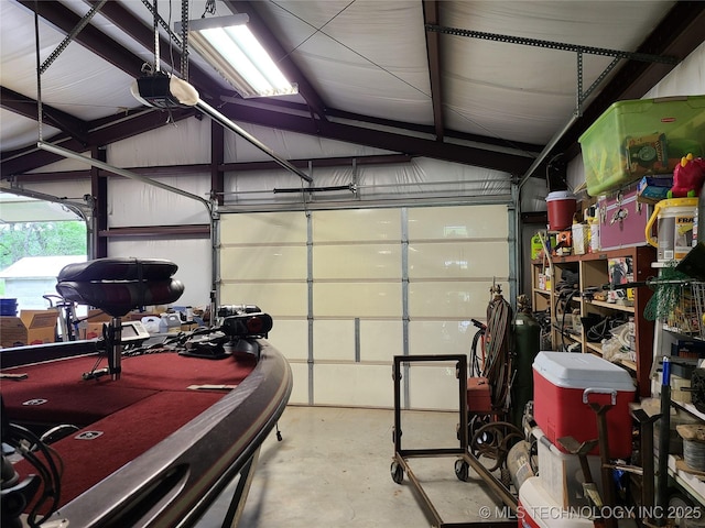 1950 Cedar Bluff Rd, Fort Gibson, OK 74434 - garage featuring a garage door opener