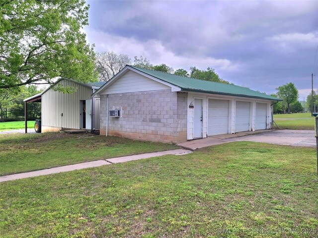 1950 Cedar Bluff Rd, Fort Gibson, OK 74434 - view of front of home featuring a garage, a front yard, and metal roof