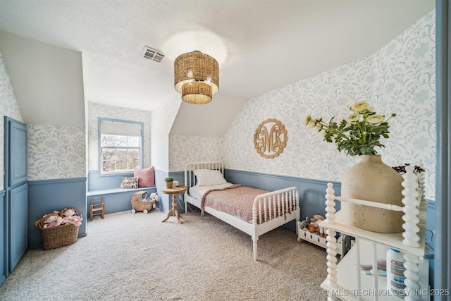 11818 N Harvard Ave, Skiatook, OK 74070 - bedroom featuring wallpapered walls, wainscoting, carpet, and vaulted ceiling