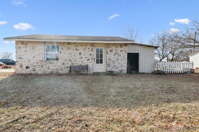 11818 N Harvard Ave, Skiatook, OK 74070 - back of property featuring stone siding and board and batten siding