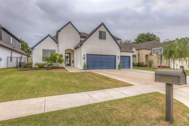 6705 S Palm Ave, Broken Arrow, OK 74011 - french country inspired facade with driveway, brick siding, and a garage