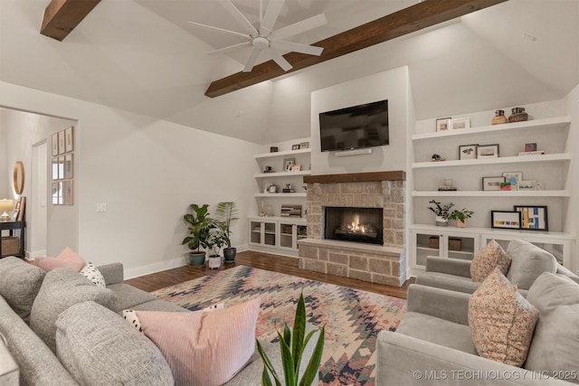 6705 S Palm Ave, Broken Arrow, OK 74011 - living area with baseboards, wood finished floors, a ceiling fan, and a fireplace