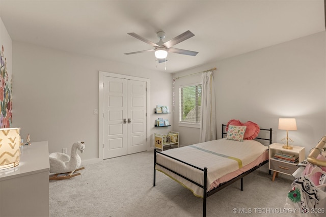 6705 S Palm Ave, Broken Arrow, OK 74011 - carpeted bedroom featuring a ceiling fan and a closet
