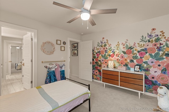 6705 S Palm Ave, Broken Arrow, OK 74011 - bedroom featuring a ceiling fan and light carpet