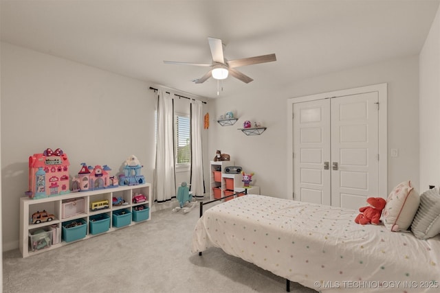 6705 S Palm Ave, Broken Arrow, OK 74011 - bedroom with carpet floors, a closet, and ceiling fan