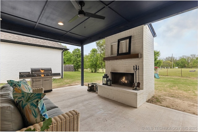 6705 S Palm Ave, Broken Arrow, OK 74011 - view of patio / terrace with an outdoor brick fireplace, a ceiling fan, and area for grilling
