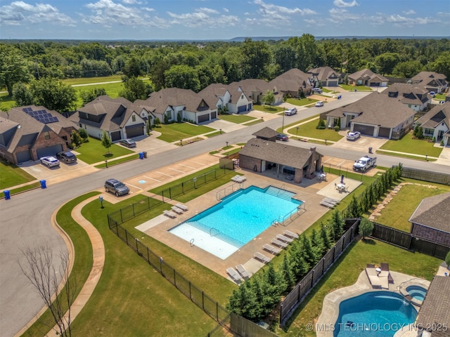6705 S Palm Ave, Broken Arrow, OK 74011 - aerial perspective of suburban area featuring a pool area
