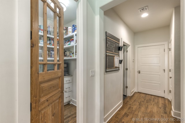 6705 S Palm Ave, Broken Arrow, OK 74011 - hall with dark wood-style floors and baseboards