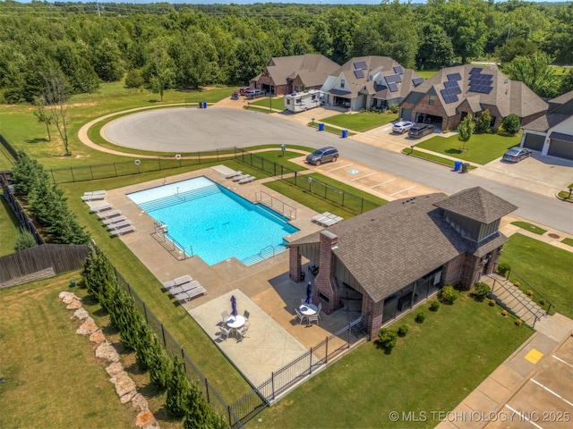 6705 S Palm Ave, Broken Arrow, OK 74011 - drone / aerial view of a heavily wooded area and a pool area