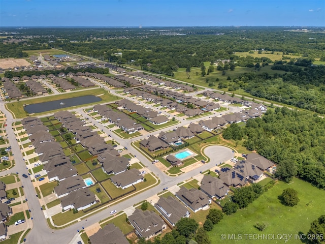 6705 S Palm Ave, Broken Arrow, OK 74011 - aerial view of property and surrounding area featuring nearby suburban area and a large body of water