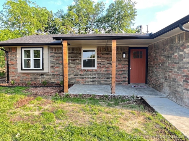 11522 E 64th St, Broken Arrow, OK 74012 - view of front of house with a front lawn and brick siding
