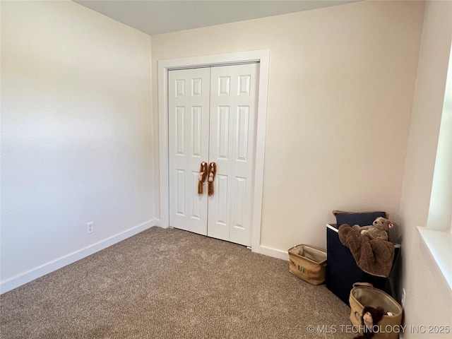 11522 E 64th St, Broken Arrow, OK 74012 - unfurnished bedroom with carpet floors, a closet, and baseboards