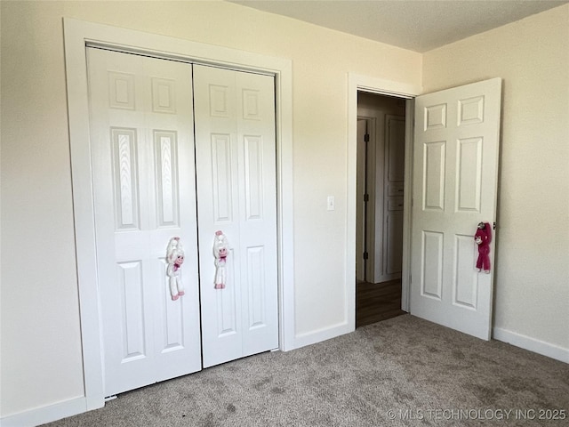 11522 E 64th St, Broken Arrow, OK 74012 - unfurnished bedroom with carpet flooring, baseboards, and a closet