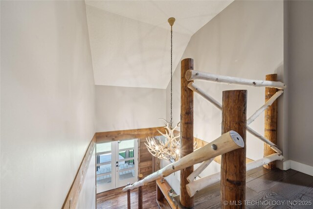 20119 E Willis Rd, Tahlequah, OK 74464 - stairs with a chandelier, wood finished floors, and high vaulted ceiling