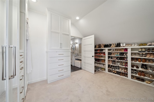 20119 E Willis Rd, Tahlequah, OK 74464 - walk in closet with light carpet and vaulted ceiling