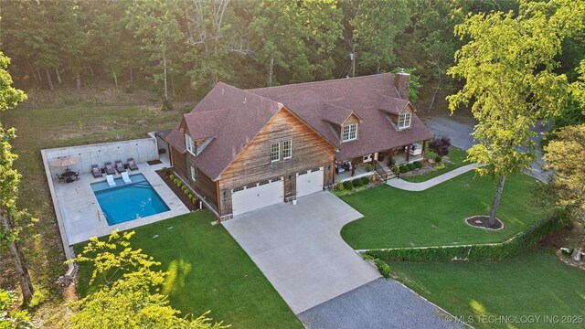 20119 E Willis Rd, Tahlequah, OK 74464 - aerial view of property and surrounding area with a pool and a heavily wooded area