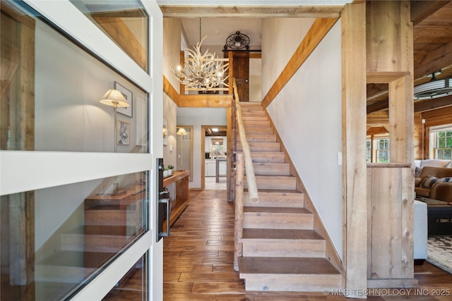 20119 E Willis Rd, Tahlequah, OK 74464 - stairway featuring wood-type flooring and a chandelier