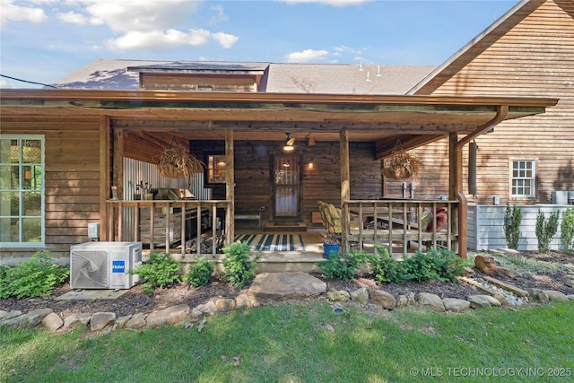 20119 E Willis Rd, Tahlequah, OK 74464 - back of house featuring ac unit and covered porch