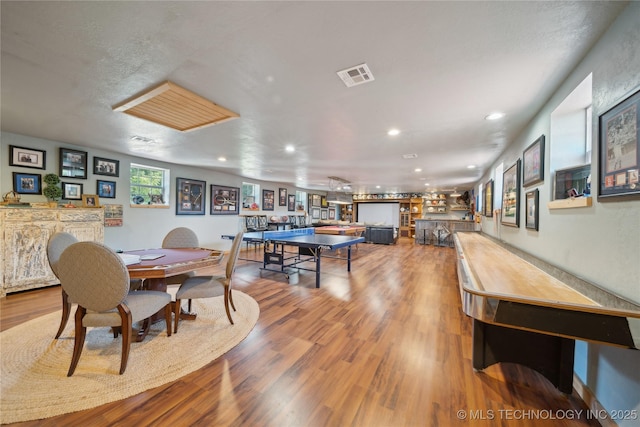 20119 E Willis Rd, Tahlequah, OK 74464 - playroom featuring a community bar, wood finished floors, and recessed lighting