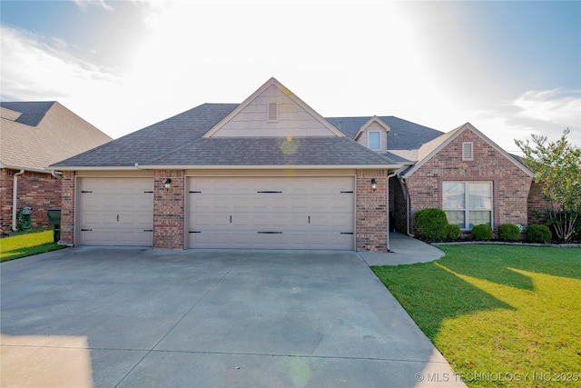 9241 N 144th E Ave, Owasso, OK 74055 - traditional-style home with concrete driveway, an attached garage, brick siding, a front lawn, and a shingled roof