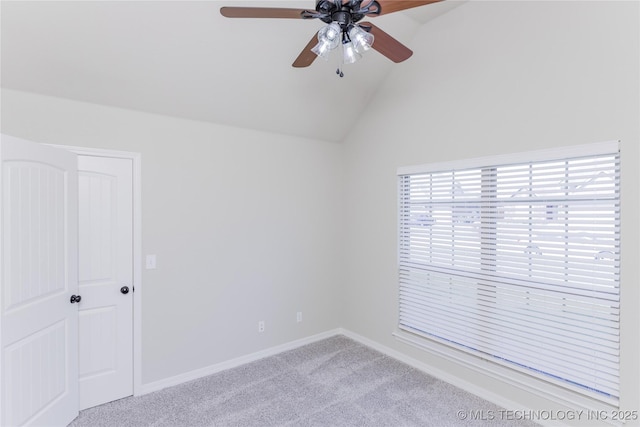 9241 N 144th E Ave, Owasso, OK 74055 - empty room with carpet, a ceiling fan, lofted ceiling, and baseboards