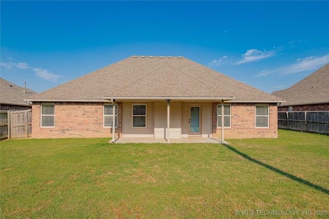 9241 N 144th E Ave, Owasso, OK 74055 - back of house with brick siding, a patio, and roof with shingles