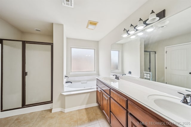 9241 N 144th E Ave, Owasso, OK 74055 - full bathroom featuring a stall shower, double vanity, a tub with jets, and tile patterned floors