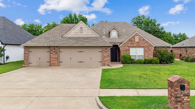 9241 N 144th E Ave, Owasso, OK 74055 - traditional-style house featuring a garage, brick siding, driveway, a front lawn, and a shingled roof