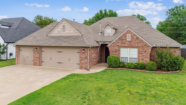 9241 N 144th E Ave, Owasso, OK 74055 - traditional-style home featuring brick siding, a garage, concrete driveway, and a front lawn