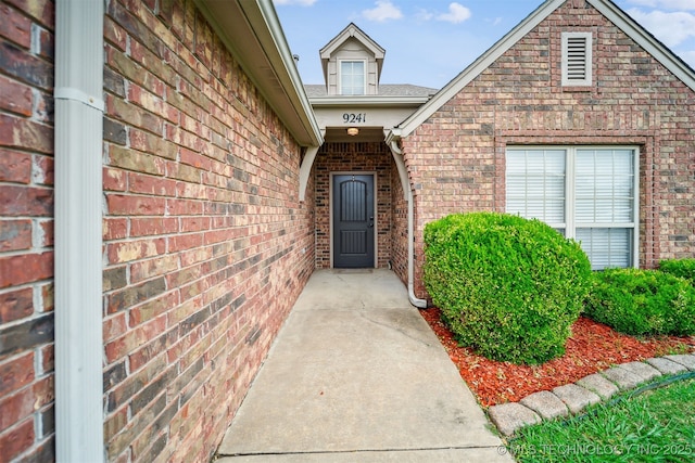 9241 N 144th E Ave, Owasso, OK 74055 - property entrance featuring brick siding