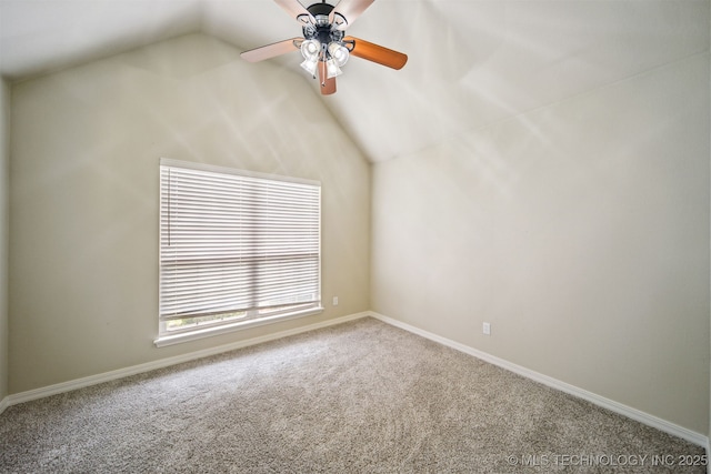 9241 N 144th E Ave, Owasso, OK 74055 - carpeted empty room with vaulted ceiling, ceiling fan, and baseboards