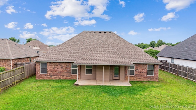 9241 N 144th E Ave, Owasso, OK 74055 - rear view of house featuring brick siding, a patio area, and a shingled roof