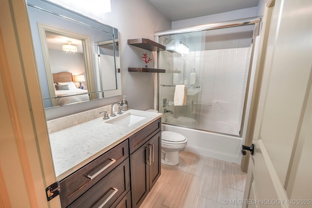 1412 E 37th St, Tulsa, OK 74105 - full bath with toilet, vanity, shower / bath combination with glass door, and connected bathroom