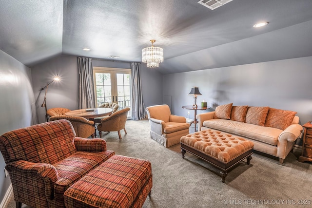 1412 E 37th St, Tulsa, OK 74105 - carpeted living area with lofted ceiling and a chandelier