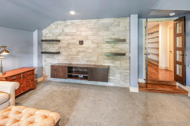 1412 E 37th St, Tulsa, OK 74105 - carpeted living area with a large fireplace, baseboards, and vaulted ceiling