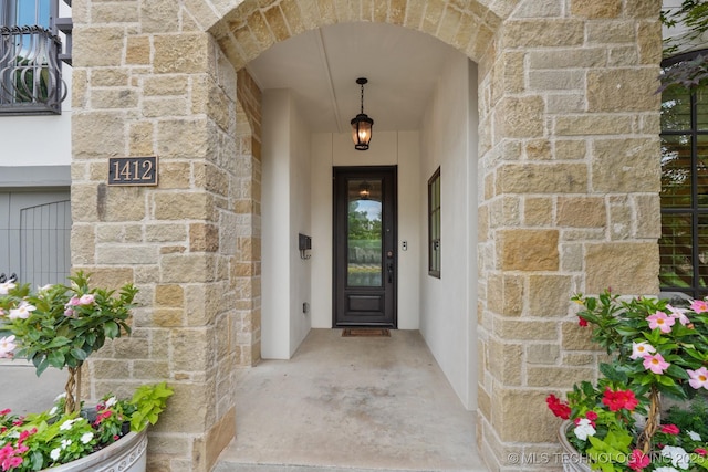 1412 E 37th St, Tulsa, OK 74105 - view of exterior entry featuring stone siding