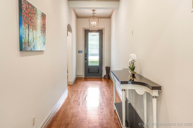 1412 E 37th St, Tulsa, OK 74105 - doorway featuring wood finished floors, baseboards, arched walkways, and ornamental molding
