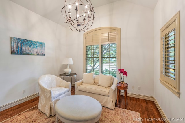 1412 E 37th St, Tulsa, OK 74105 - sitting room featuring wood finished floors, a chandelier, baseboards, and lofted ceiling