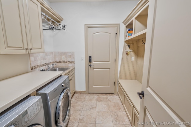 1412 E 37th St, Tulsa, OK 74105 - laundry room featuring washer and clothes dryer and cabinet space