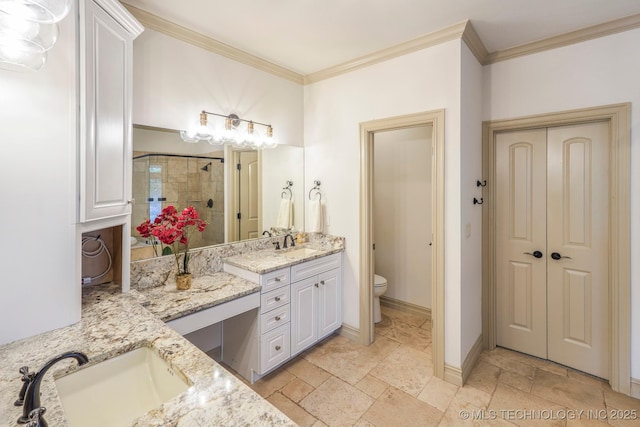 1412 E 37th St, Tulsa, OK 74105 - bathroom featuring vanity, ornamental molding, stone tile flooring, a stall shower, and toilet