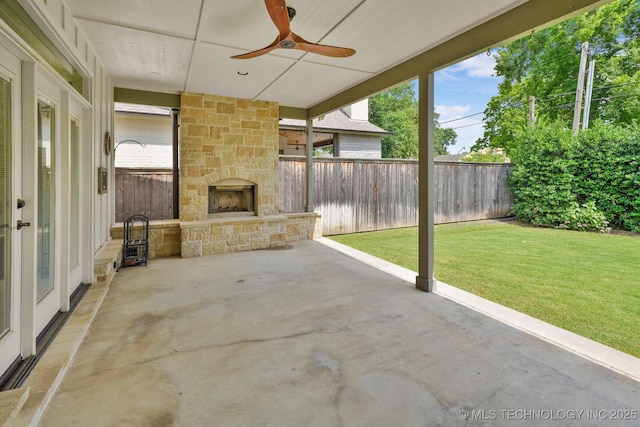 1412 E 37th St, Tulsa, OK 74105 - view of patio featuring an outdoor stone fireplace and ceiling fan