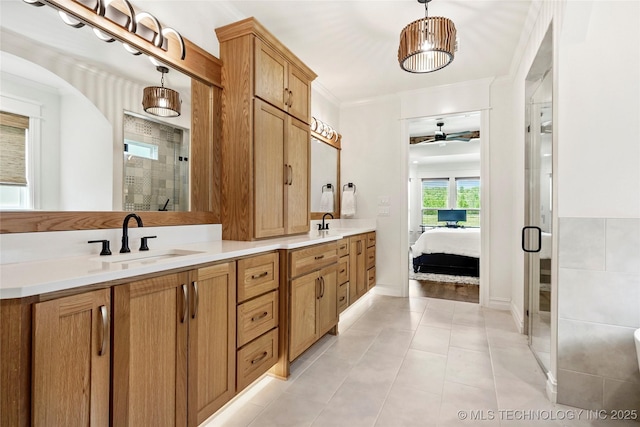 3406 W Quantico Pl, Broken Arrow, OK 74011 - ensuite bathroom featuring a shower stall, double vanity, ceiling fan, and tile patterned flooring