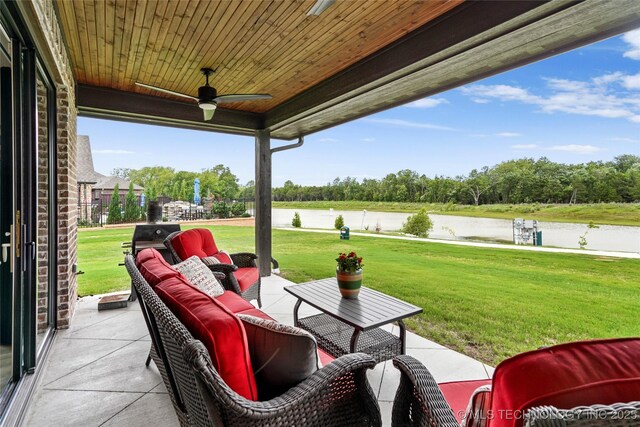 3406 W Quantico Pl, Broken Arrow, OK 74011 - view of patio with a water view, an outdoor living space, a ceiling fan, and view of wooded area