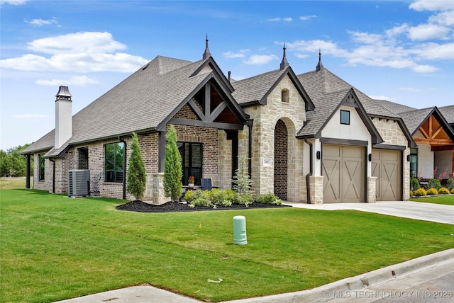 3406 W Quantico Pl, Broken Arrow, OK 74011 - view of front facade with an attached garage, stone siding, a front yard, concrete driveway, and cooling unit