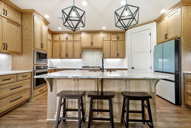 3406 W Quantico Pl, Broken Arrow, OK 74011 - kitchen featuring appliances with stainless steel finishes, recessed lighting, backsplash, a sink, and dark wood-style flooring